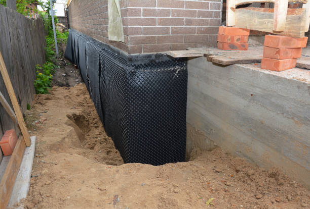 Happy homeowners after waterproofing job in Adamsville